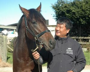 Mr Lang Lin and NZB Ready to Run graduate Mongolian Khan. Photo Credit: Wally O'Hearn.